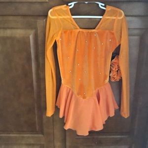 Jerry’s orange dress with rhinestones
